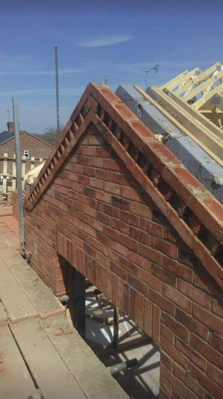 New roof with brick gable detail by Advanced Roofing